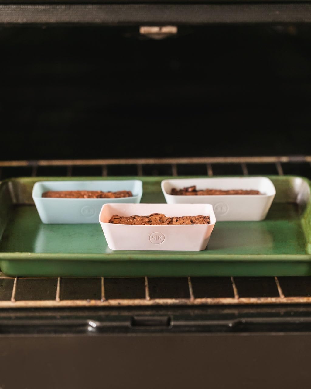 The Silicone Kitchen Silicone Individual Mini Loaf Pans - Reusable, Non-Toxic, BPA Free, Dishwasher Safe, Bento Box Accessories (12 Pack, Pink, Gray, Blue)