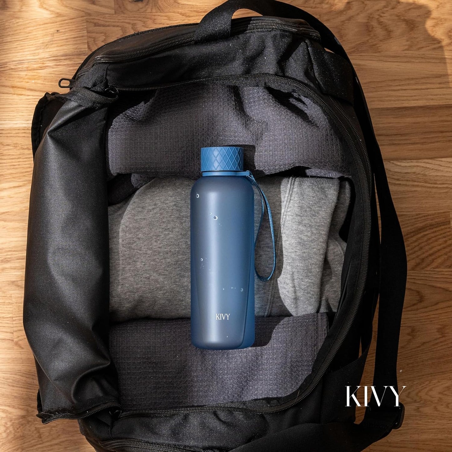 KIVY Slim Water Bottle 22oz [Lightweight & Shatterproof] - Small Drinking Waterbottle - Tritan Bottle Without Straw for School, Sport & Travel - Drinking Bottle Dishwasher Safe, BPA Free